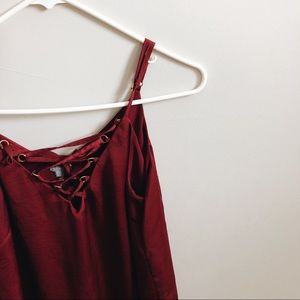 A red, silk, fancy tank top.